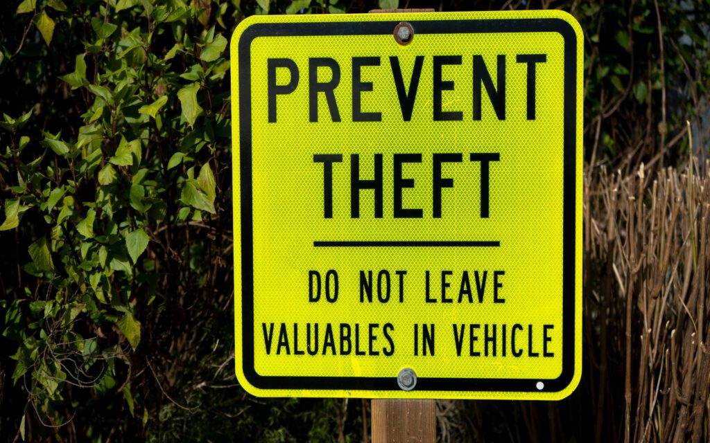 Yellow metal prevent theft sign