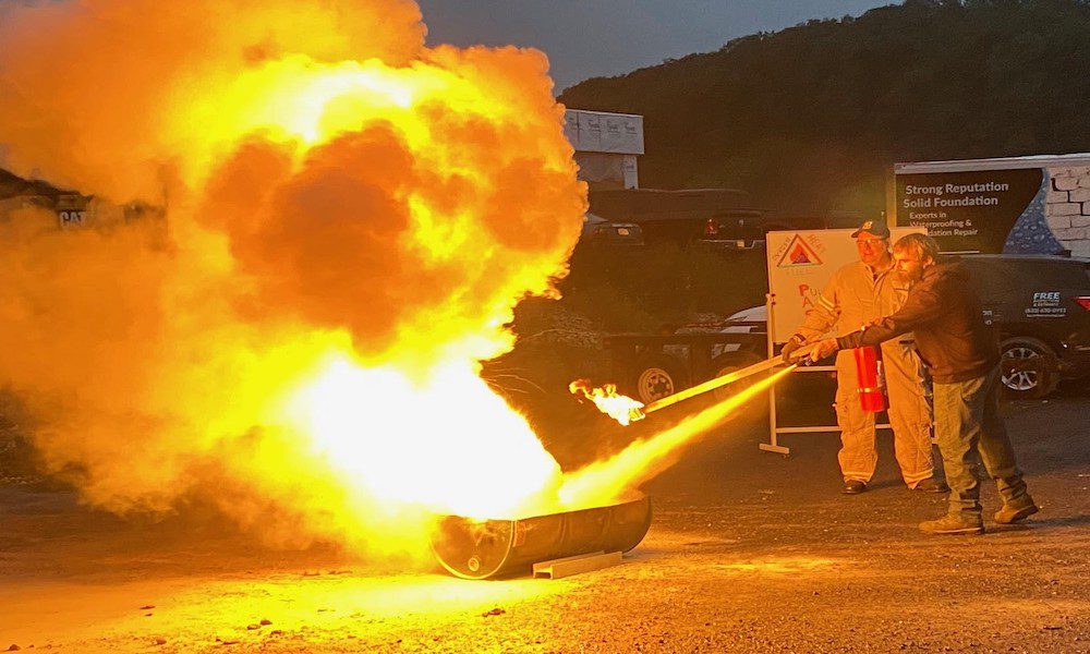 Is Risk Management Important blog-man putting out barrel fire in fire extinguisher training