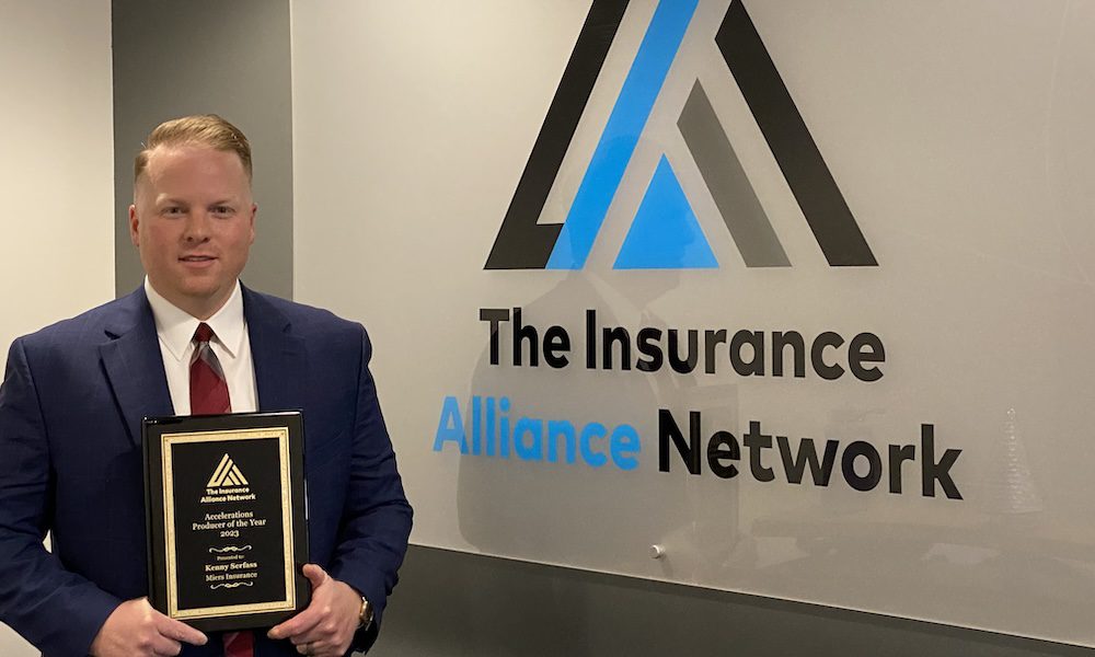 Kenny Serfass Receives Prestigious Commercial Lines Producer of the Year Prize from The Insurance Alliance Network for the Third Time. - Kenny Standing With His Award.