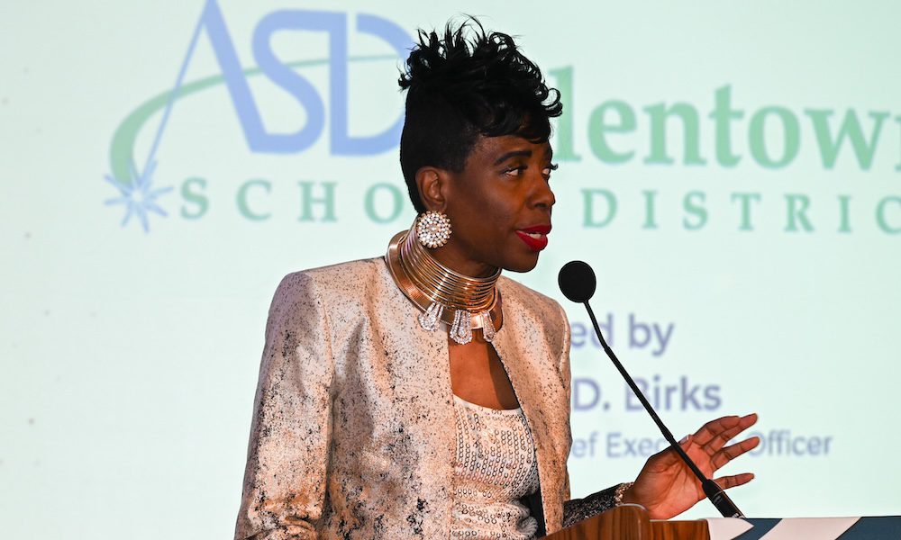 A Standing Ovation for the Allentown School District – 2025 Excellence in Business Award Winner! - Dr. Carol D. Birks speaking at a podium